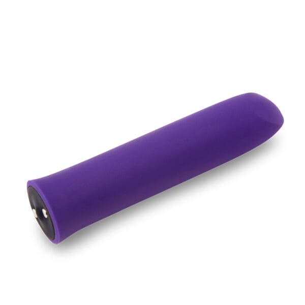 Purple silicone sex toy with a button.