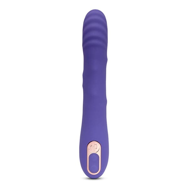 Purple silicone toy with a button.