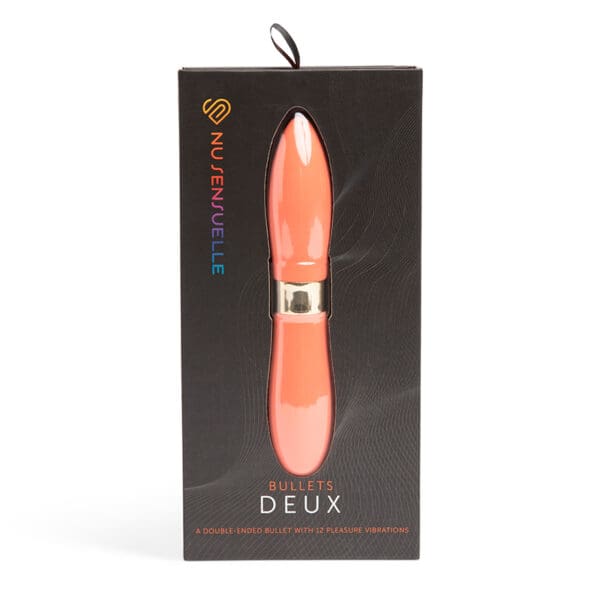 Pink double-ended bullet vibrator in box.