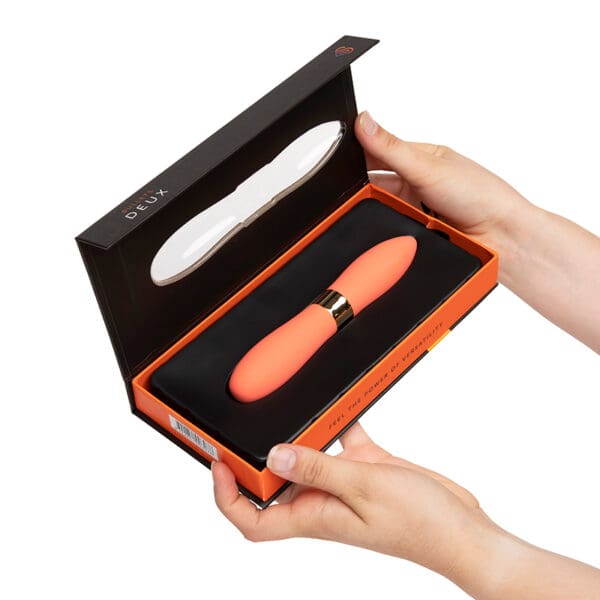 Orange sex toy in a black box.