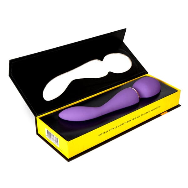 Purple wand in black and yellow box.