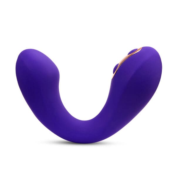 Purple and gold curved sex toy.