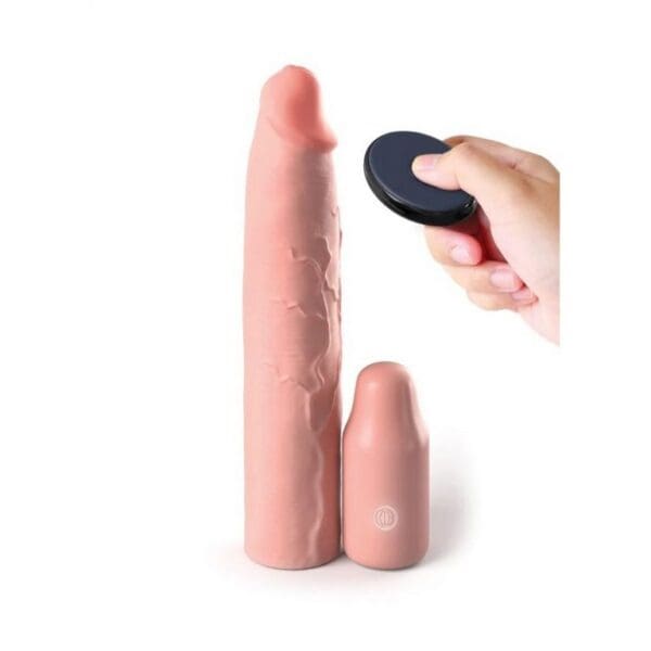A person holding a remote control next to two large dildos.