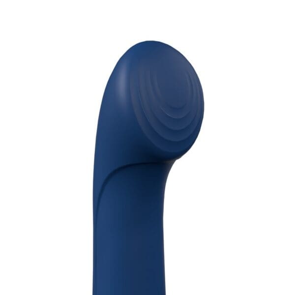 Blue curved object with textured top.