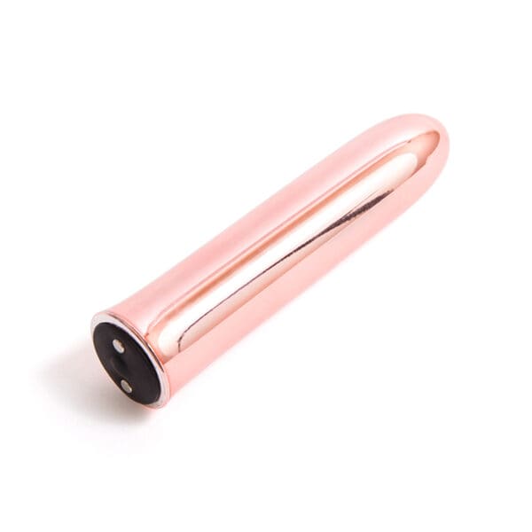 Rose gold vibrating pleasure device.