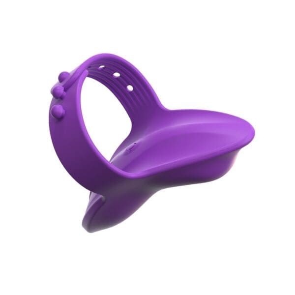 A purple plastic ring sitting on top of a table.