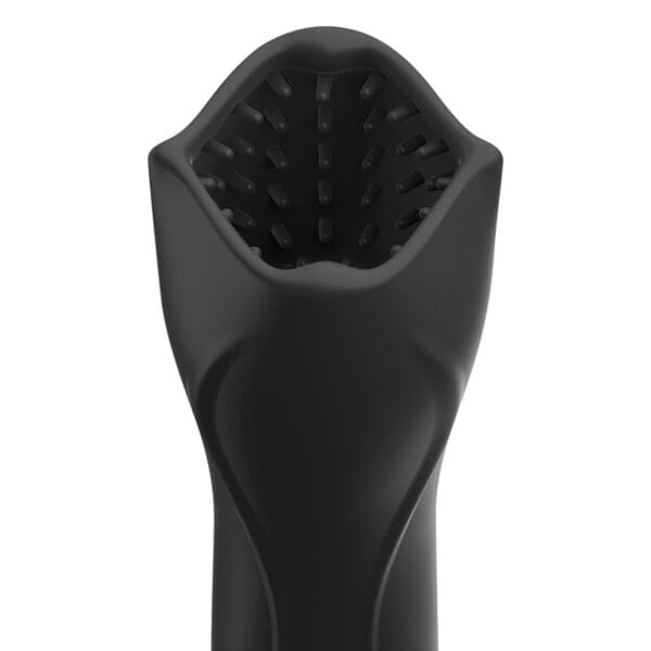 A close up of the top of a black toothbrush holder.