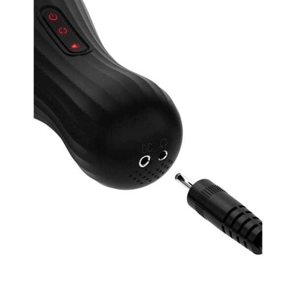 A black electric screwdriver with a face drawn on it.