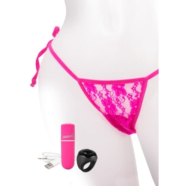 Pink lace thong with toys and accessories.