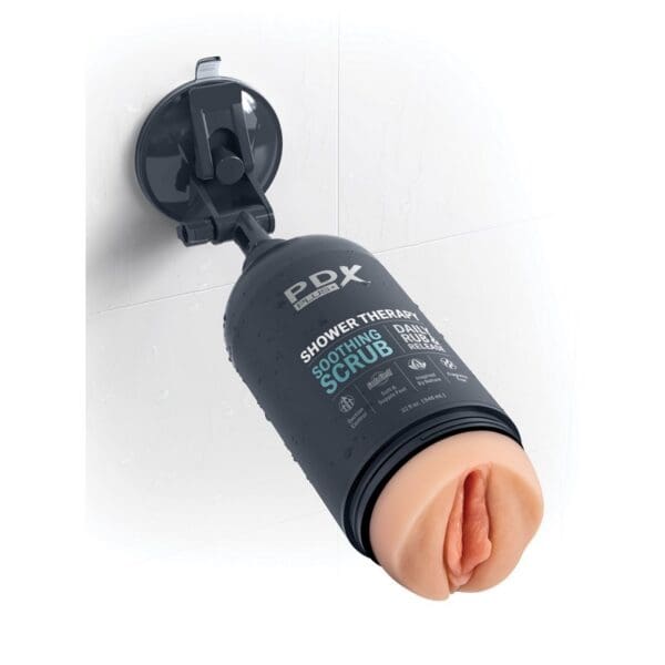 A wall mounted sex toy with a condom in it.