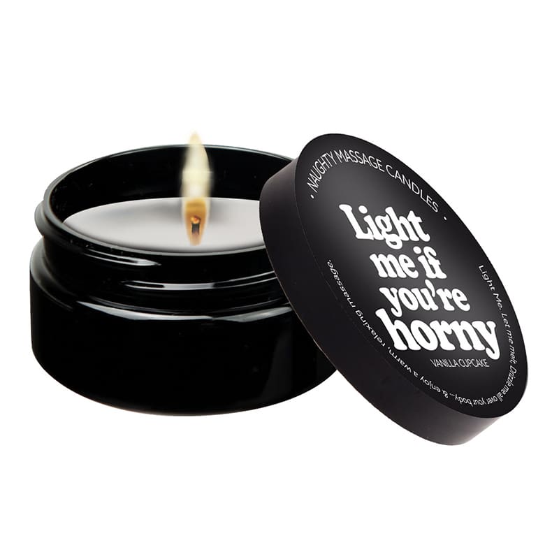 A candle that is sitting in a container.
