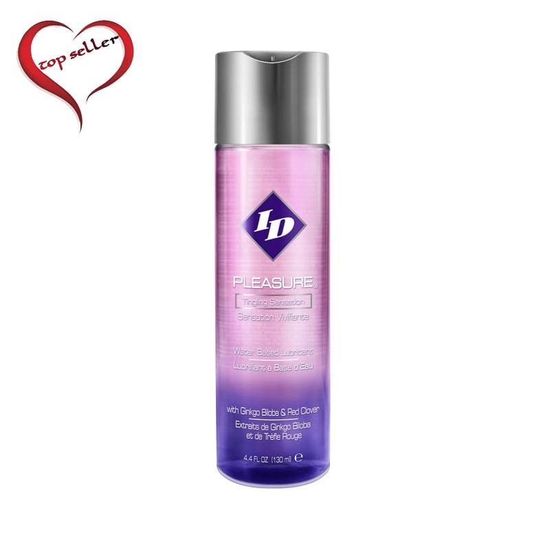 A bottle of pink and purple lotion with a heart
