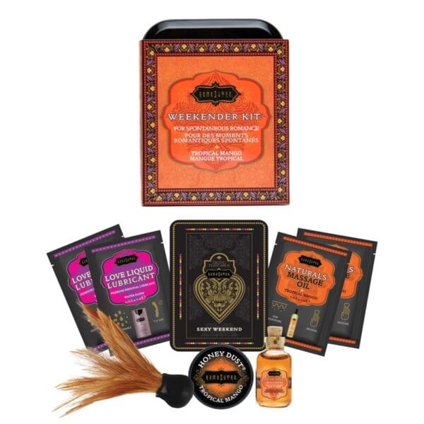 A box of halloween themed products including candles, soap and makeup.
