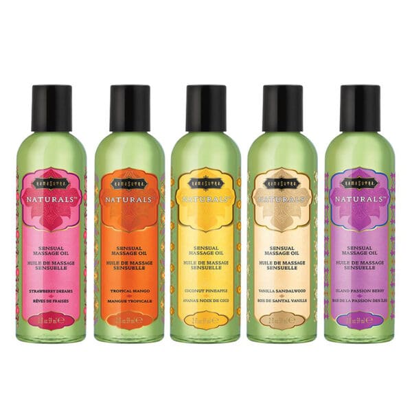 A group of bottles with different flavors of massage oils.