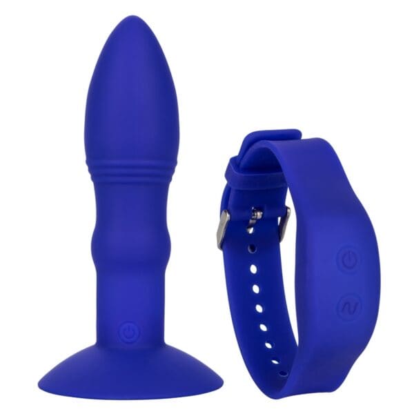 A blue strap and a purple dildo