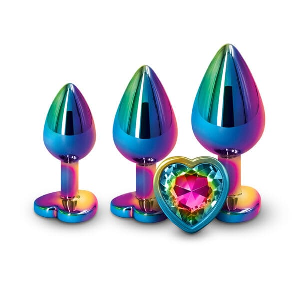 Three rainbow heart-shaped anal plugs.